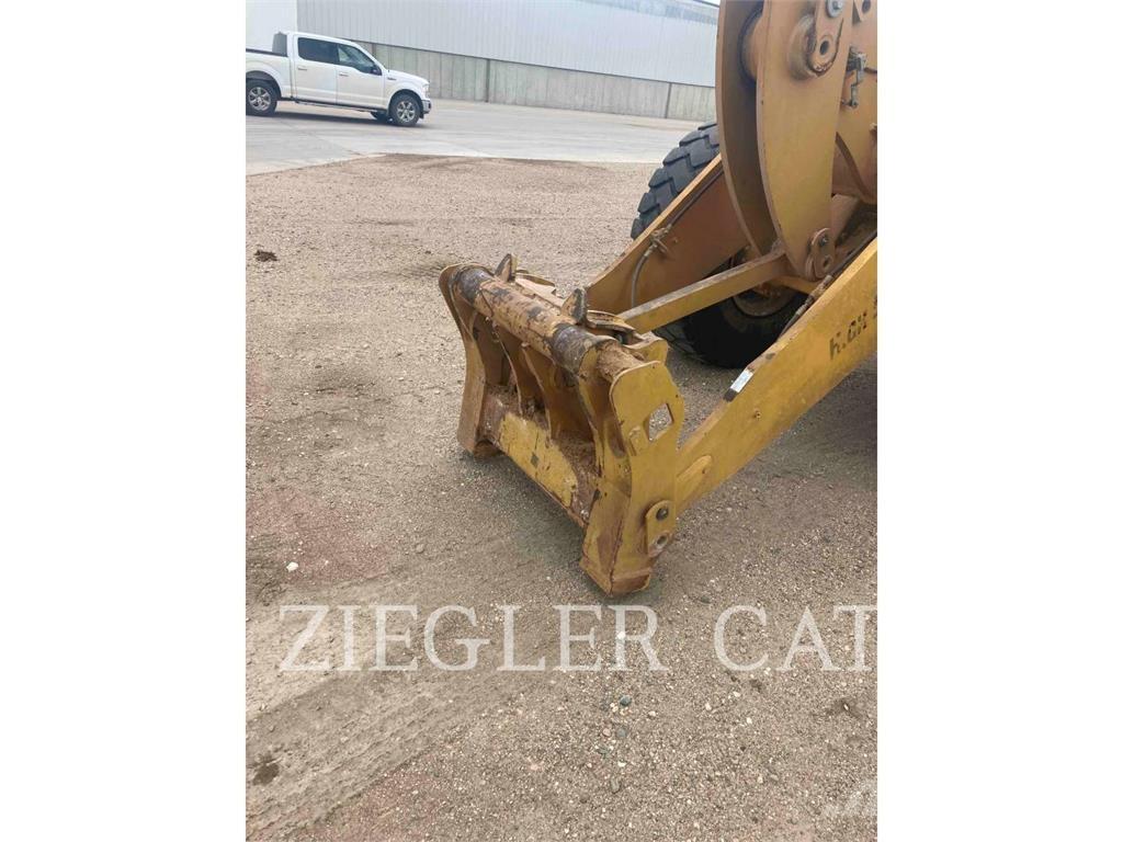 CAT 938M لوادر بعجل