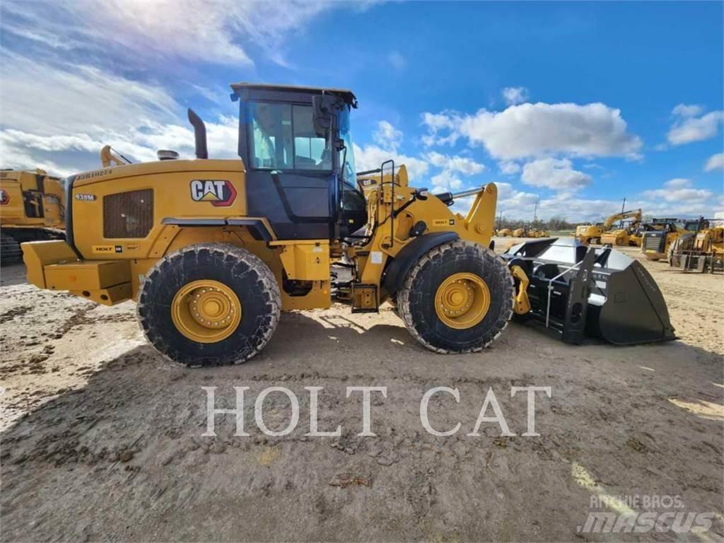 CAT 938M QC لوادر بعجل