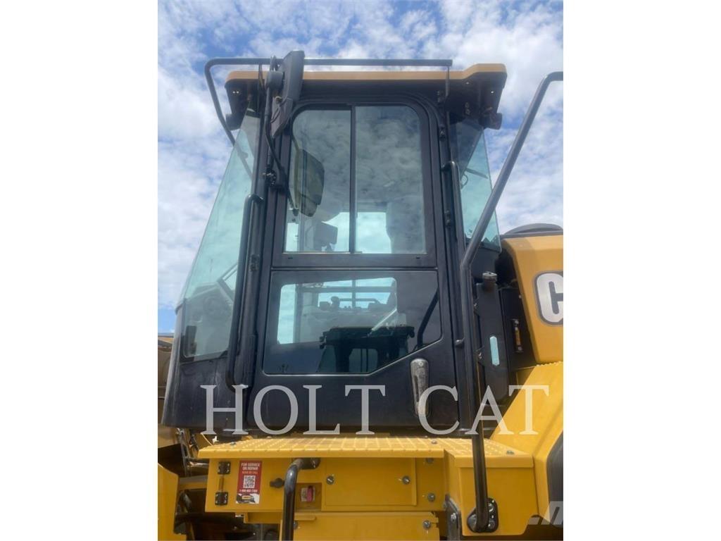 CAT 950 لوادر بعجل