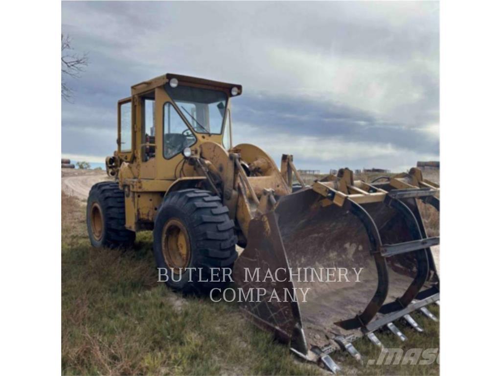 CAT 950 لوادر بعجل