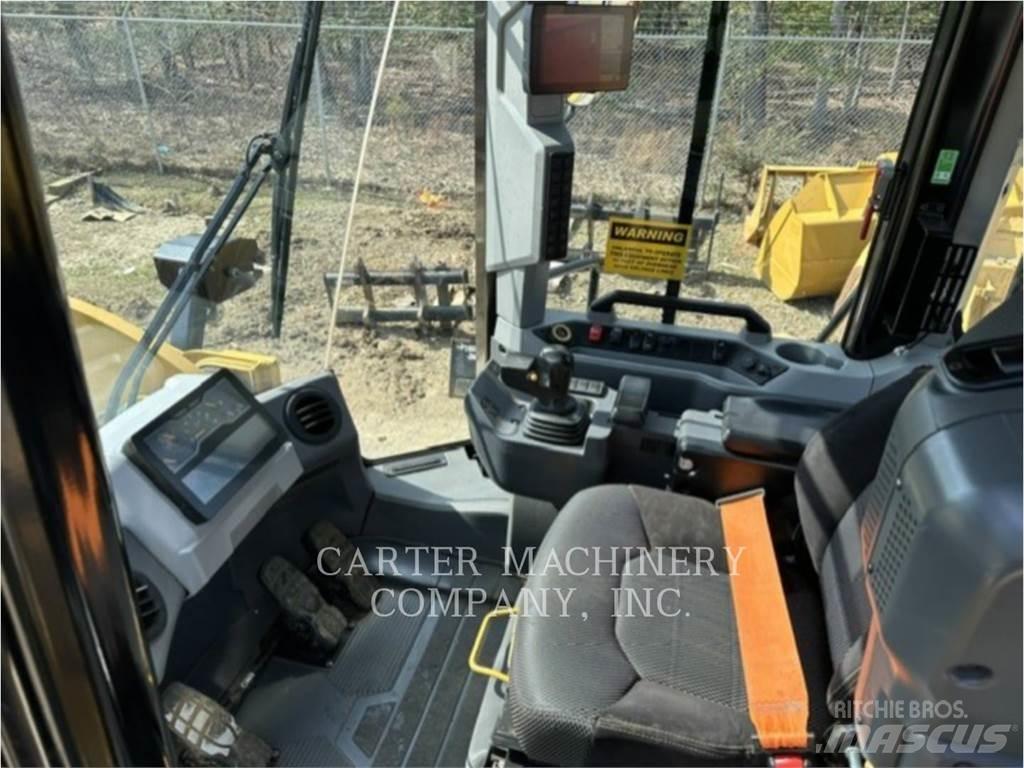 CAT 950-14 لوادر بعجل