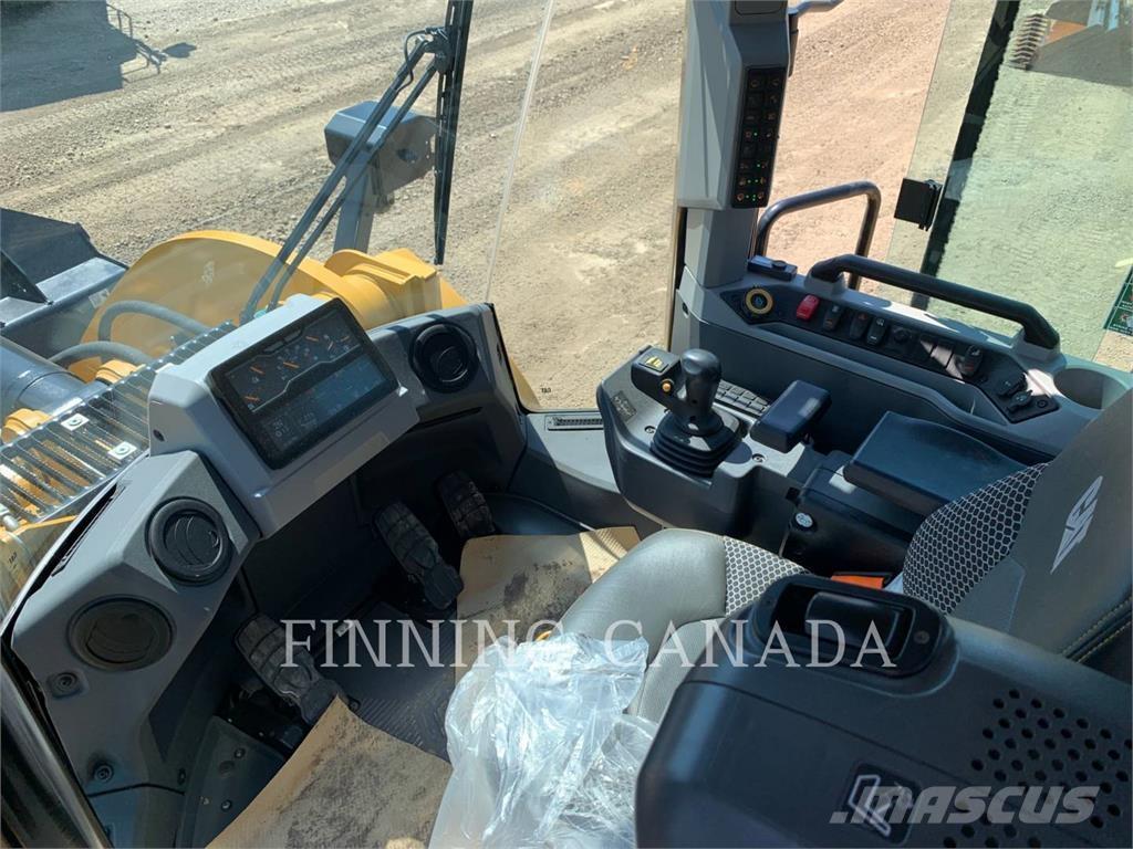 CAT 950-14 لوادر بعجل