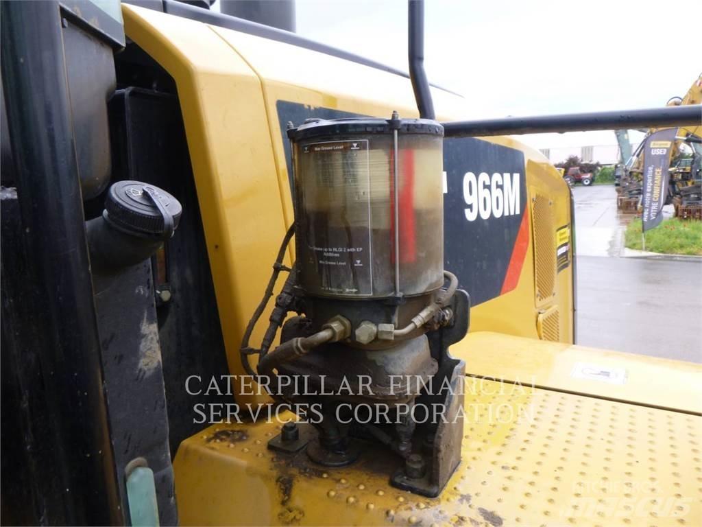CAT 966M لوادر بعجل