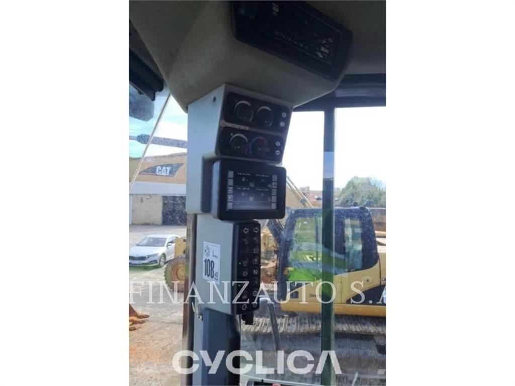 CAT 966M لوادر بعجل