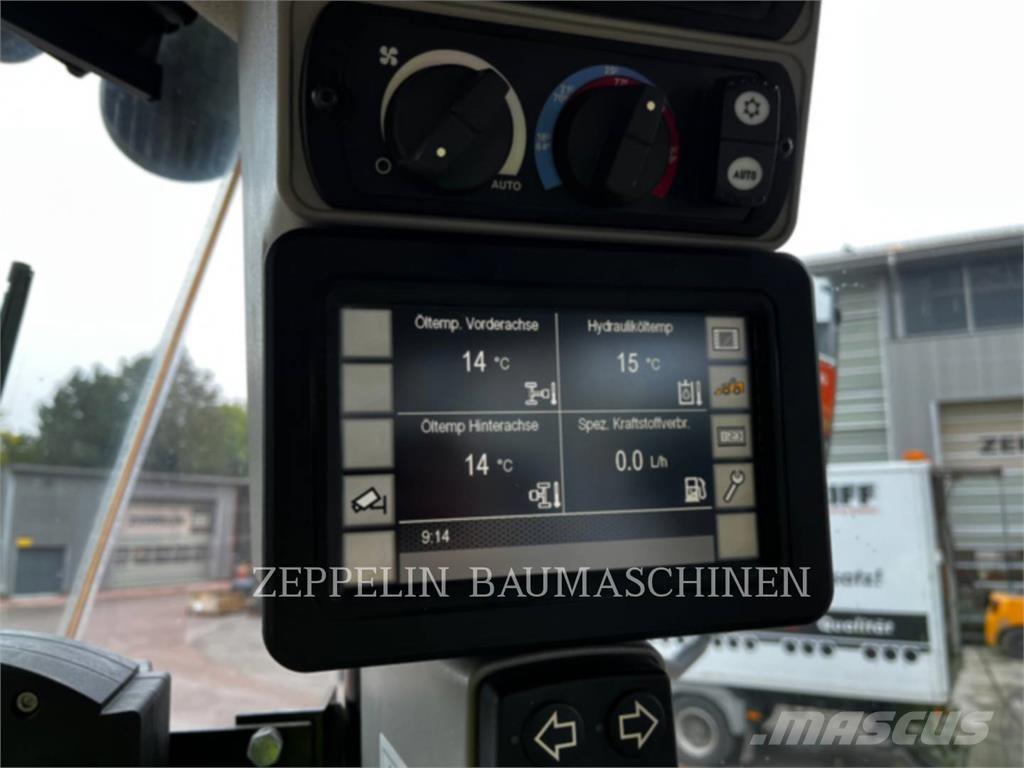 CAT 966M لوادر بعجل