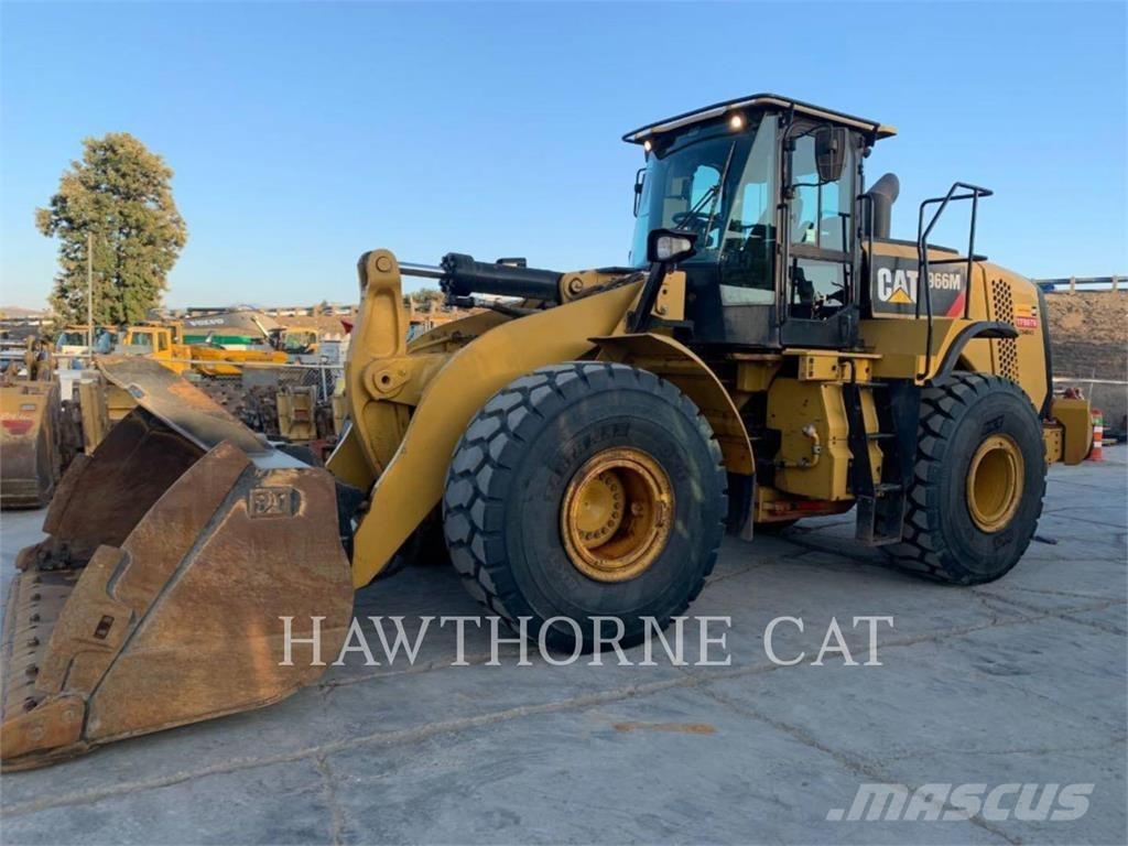 CAT 966M لوادر بعجل