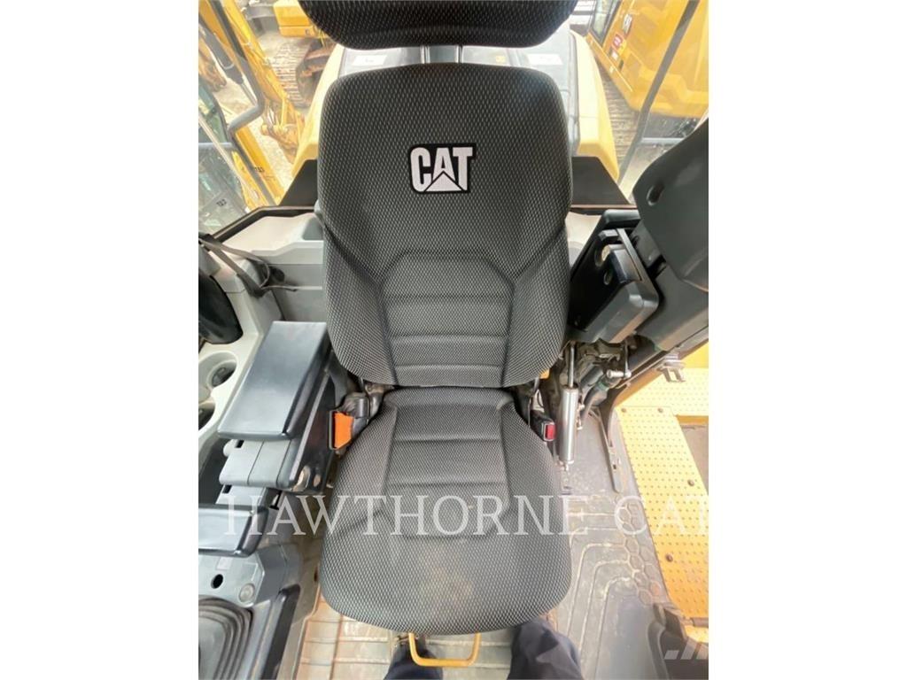 CAT 966M لوادر بعجل