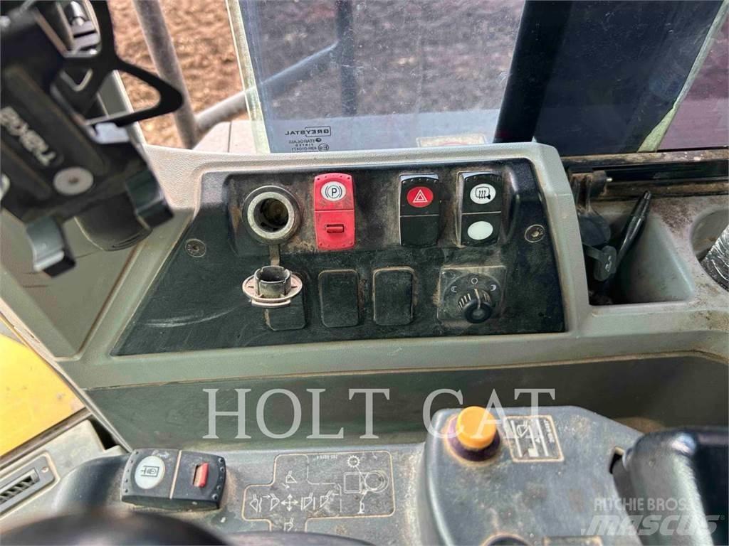 CAT 980M لوادر بعجل