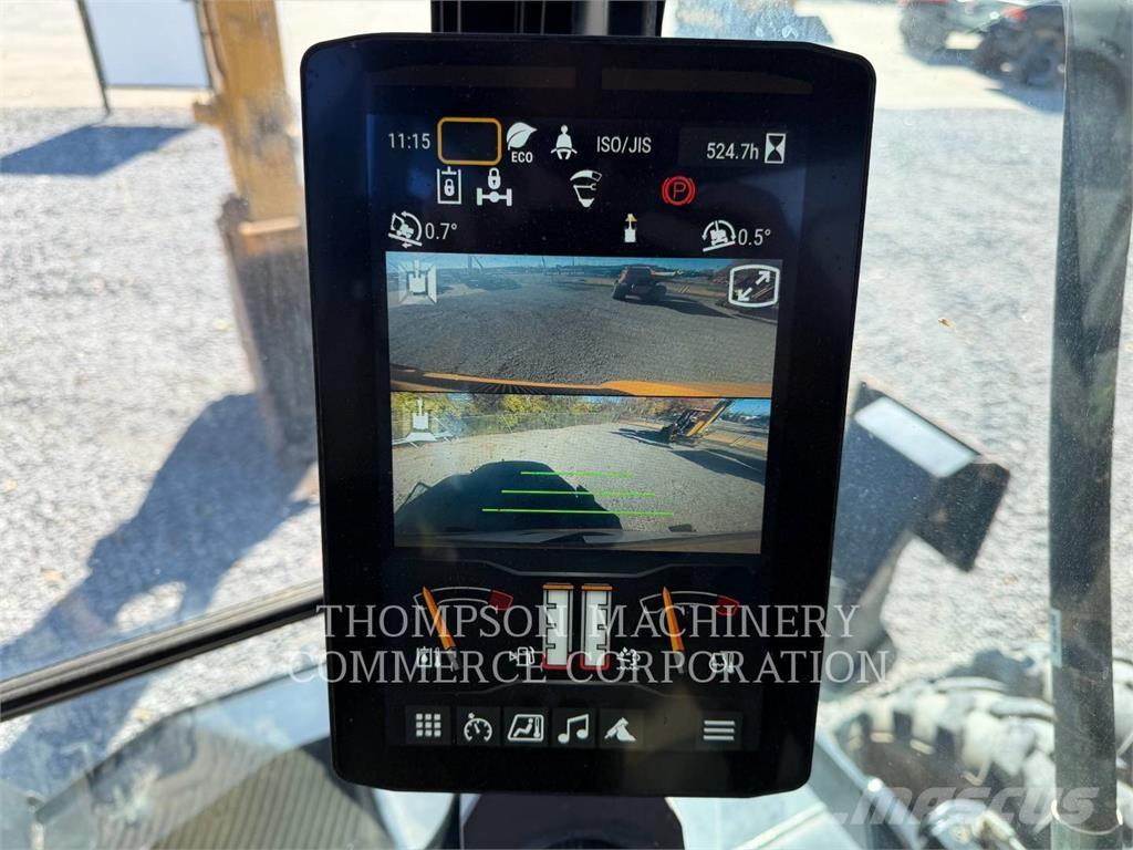 CAT M 318 حفارات بعجل