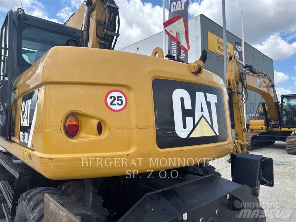 CAT M313D حفارات بعجل