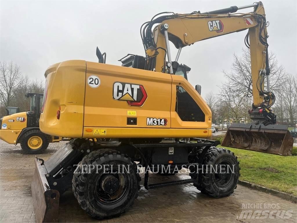 CAT M314-07A حفارات بعجل