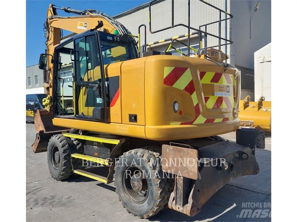 CAT M314F حفارات بعجل
