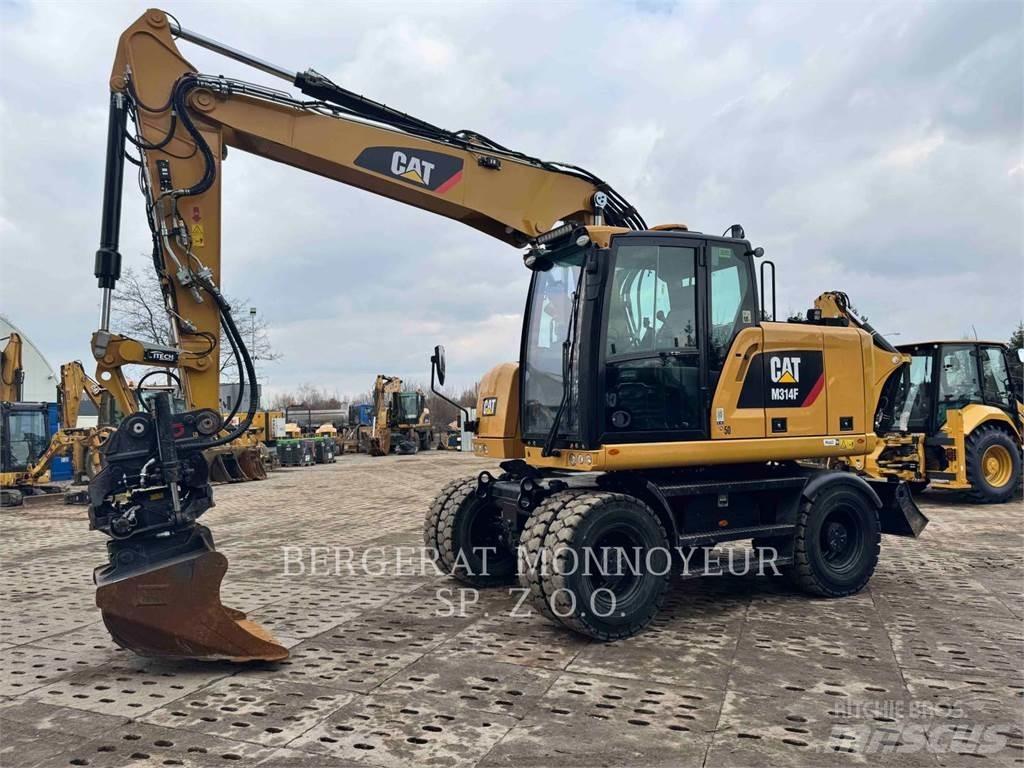 CAT M314F حفارات بعجل