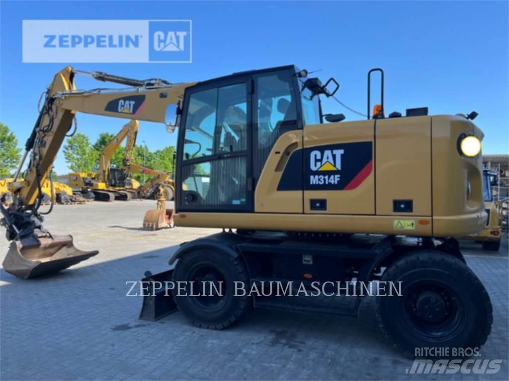 CAT M314F حفارات بعجل