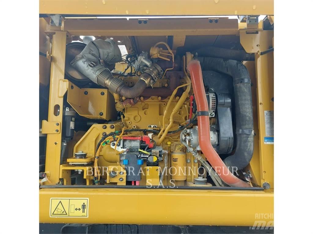 CAT M315 حفارات بعجل