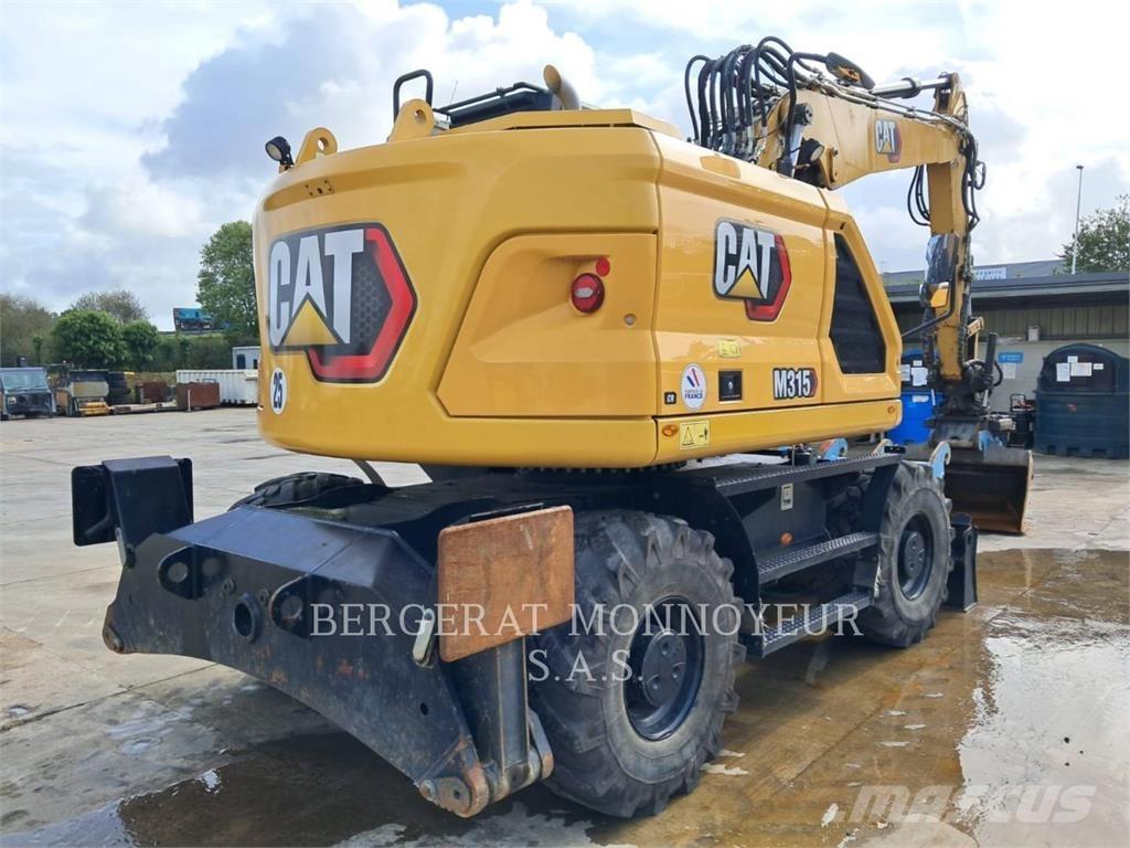 CAT M315 حفارات بعجل