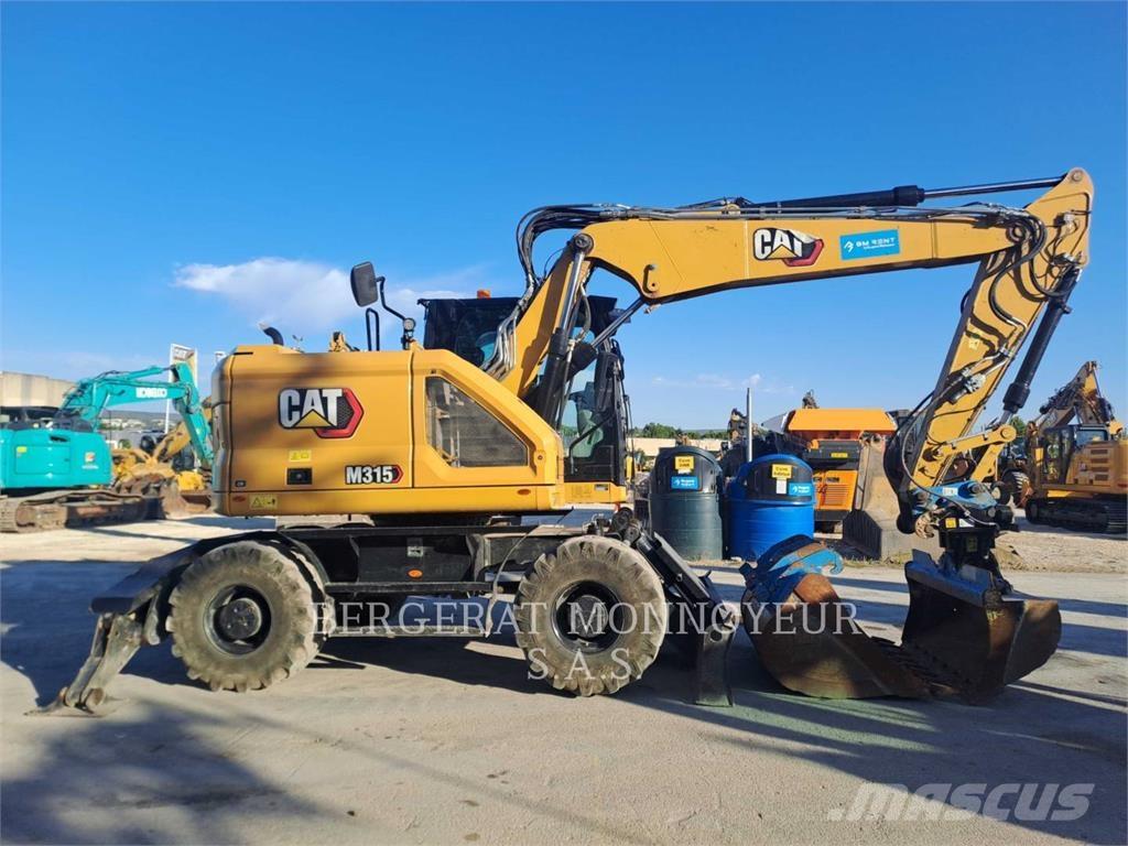 CAT M315 حفارات بعجل