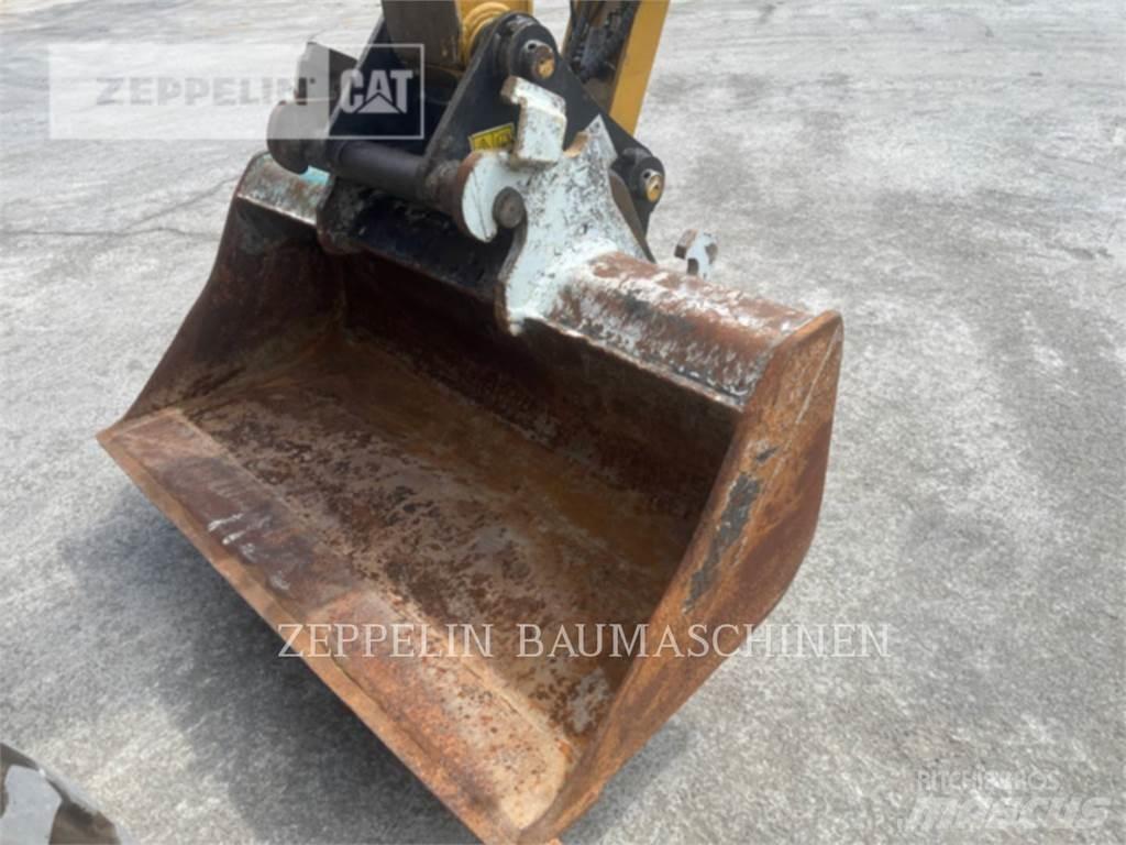 CAT M315-07A حفارات بعجل
