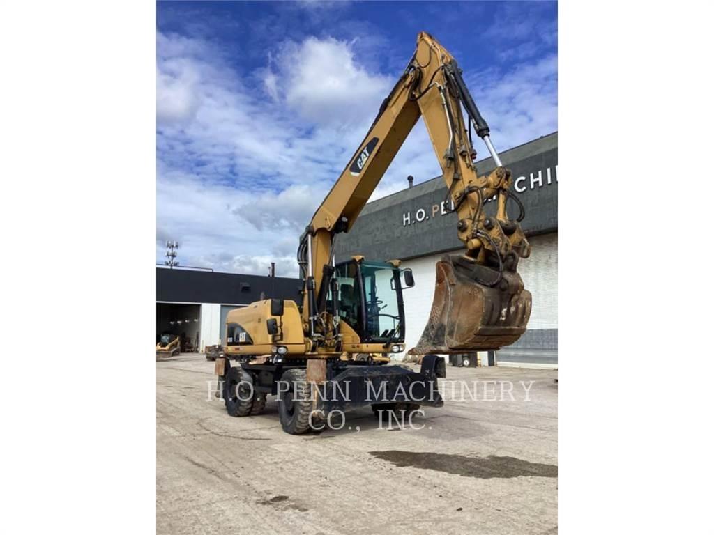 CAT M315D حفارات بعجل