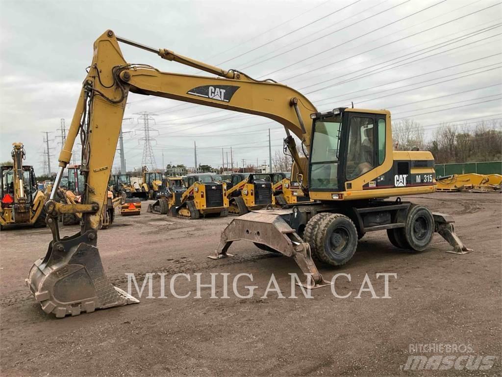 CAT M315D حفارات بعجل