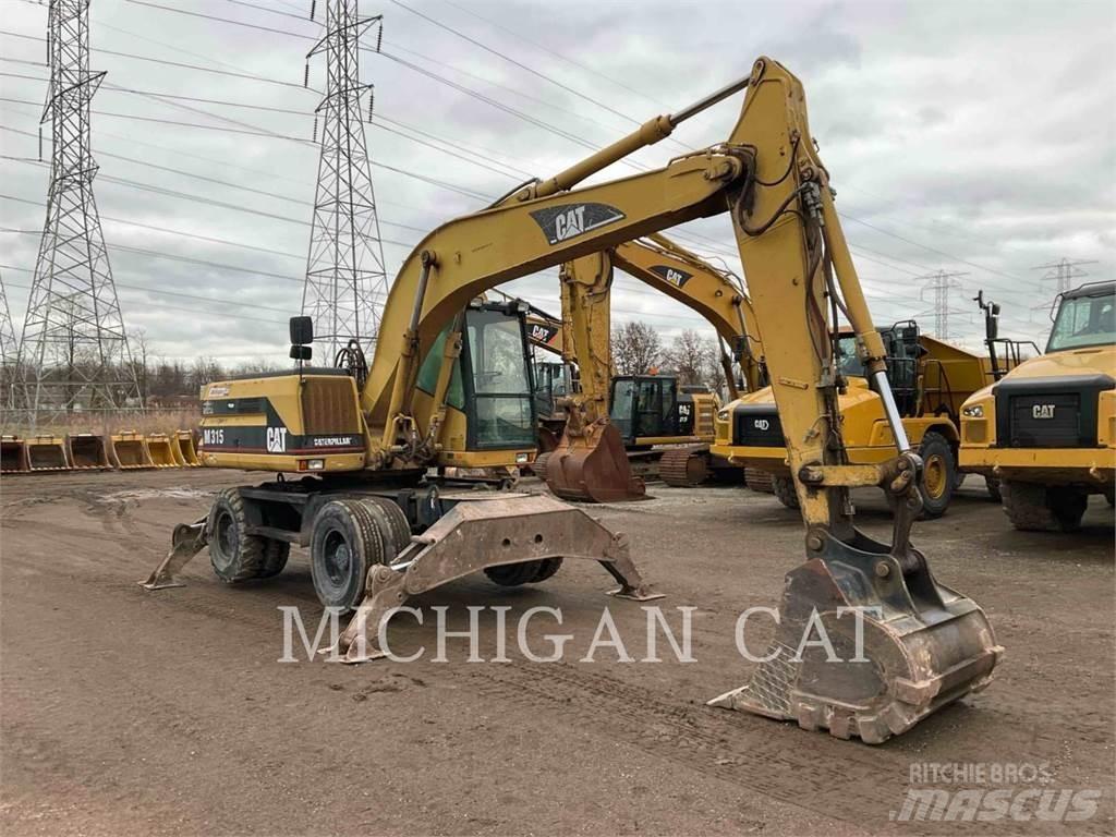 CAT M315D حفارات بعجل