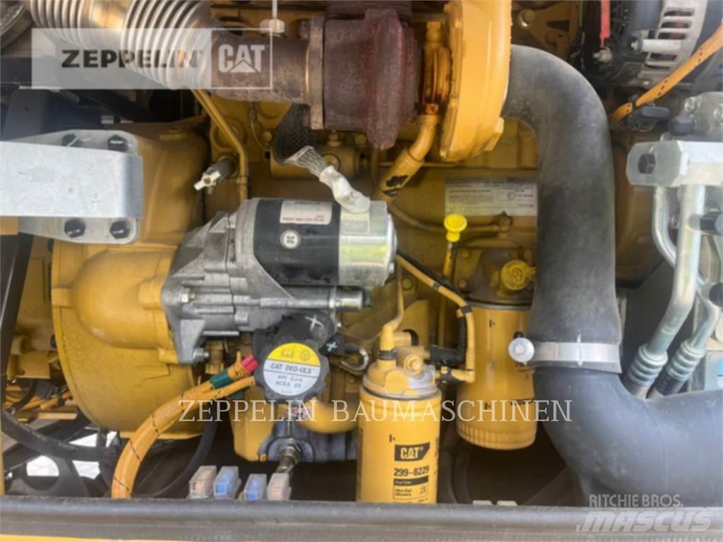 CAT M315D حفارات بعجل