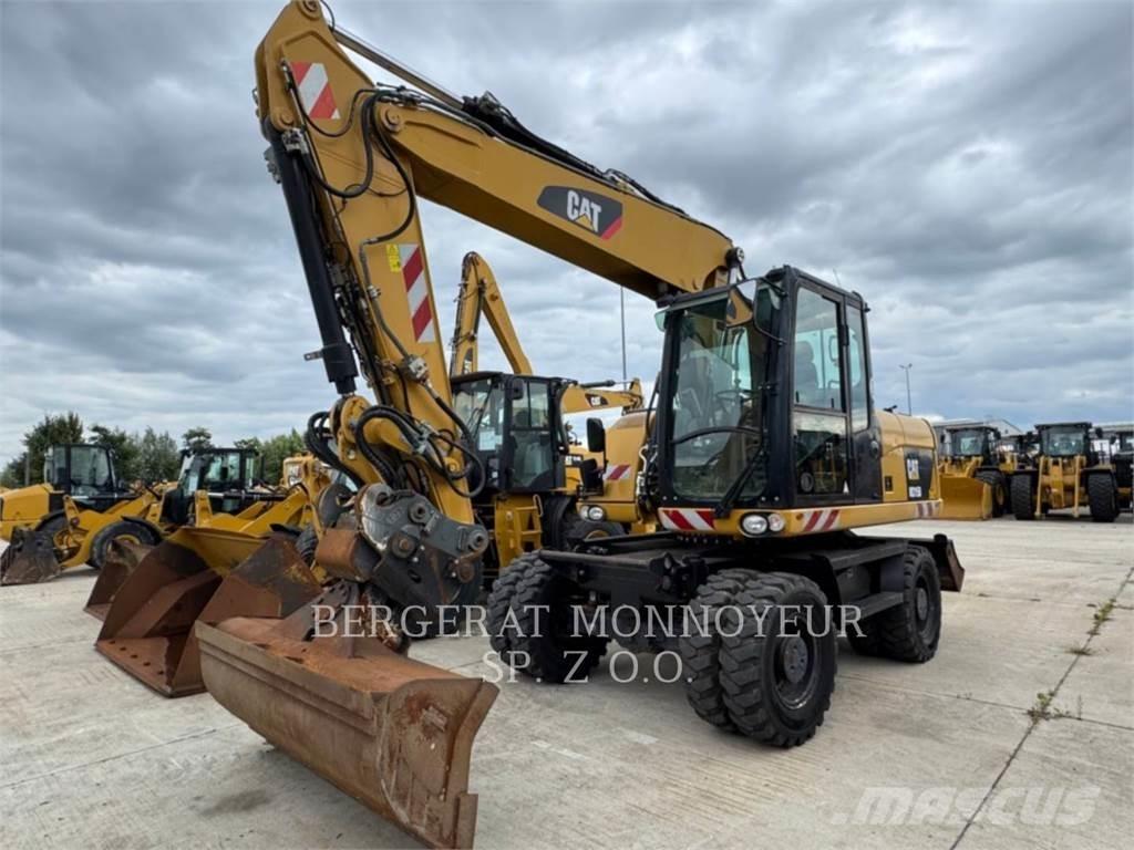 CAT M315D حفارات بعجل