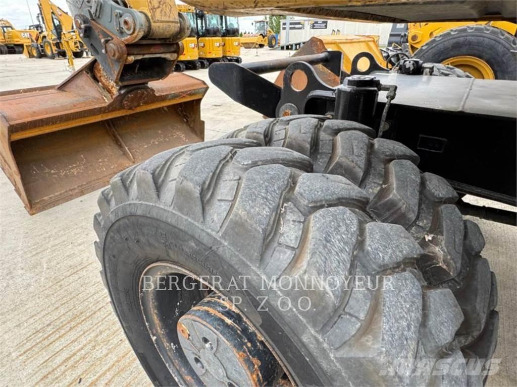 CAT M315D حفارات بعجل