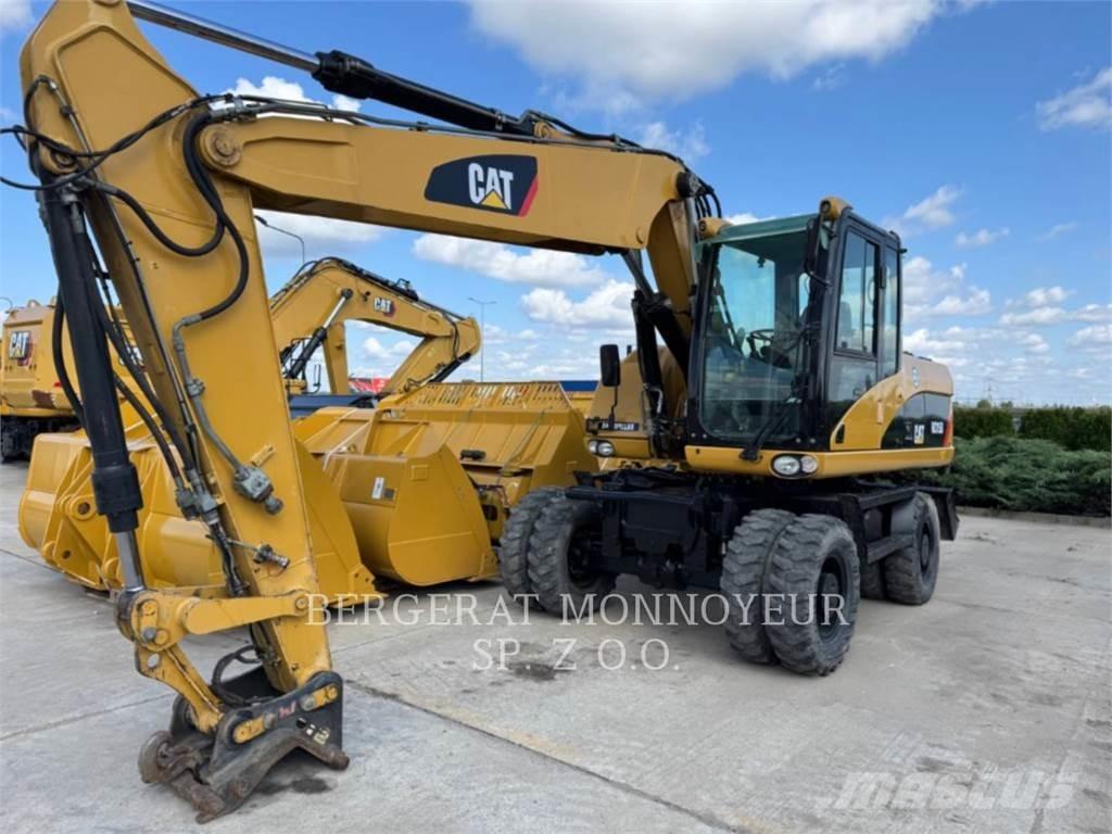 CAT M315D حفارات بعجل
