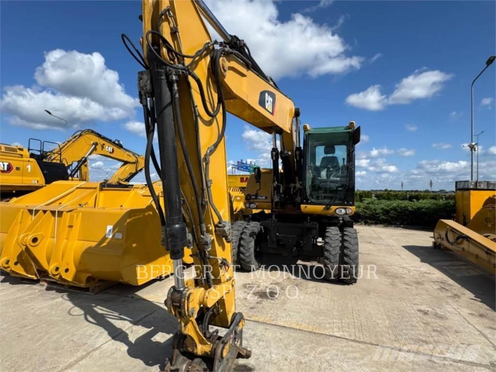 CAT M315D حفارات بعجل