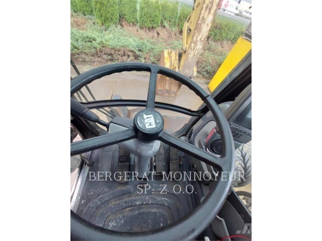CAT M315D حفارات بعجل