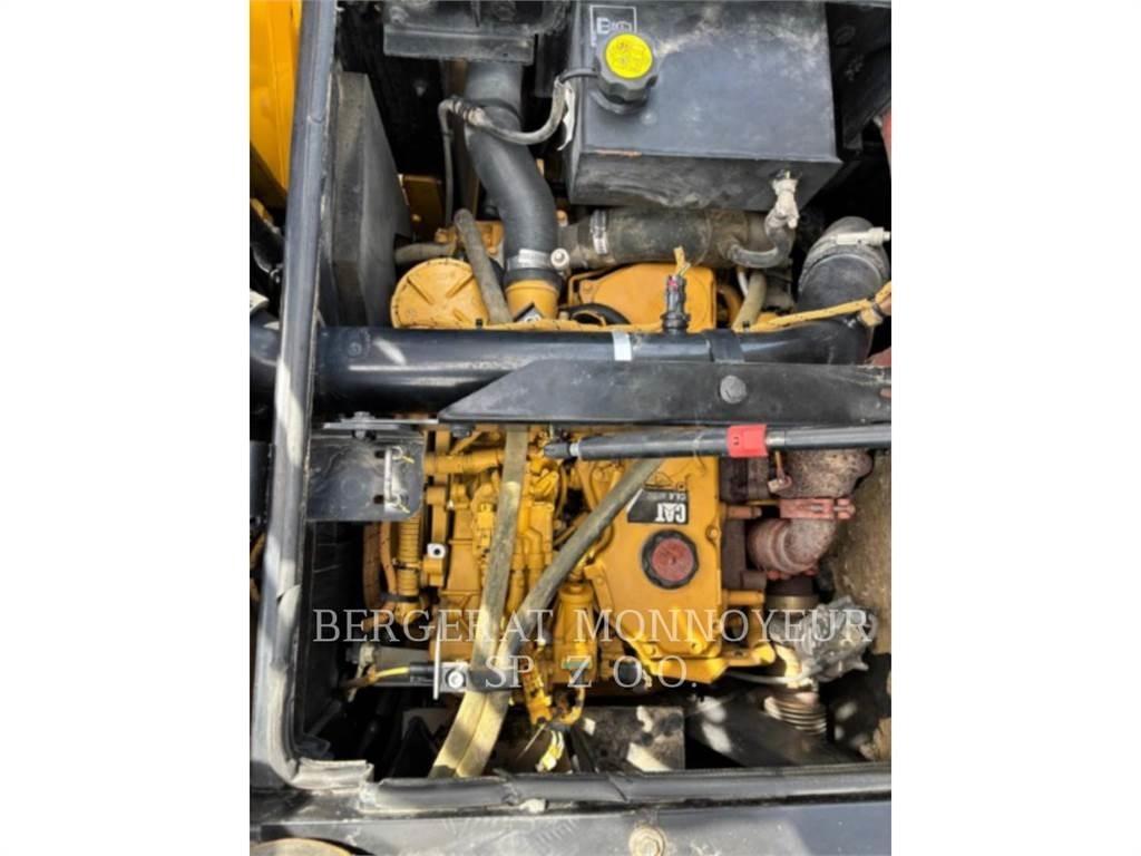 CAT M315F حفارات بعجل