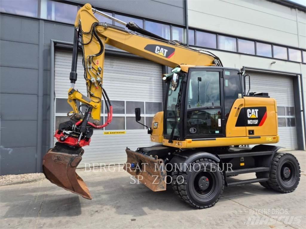 CAT M315F حفارات بعجل