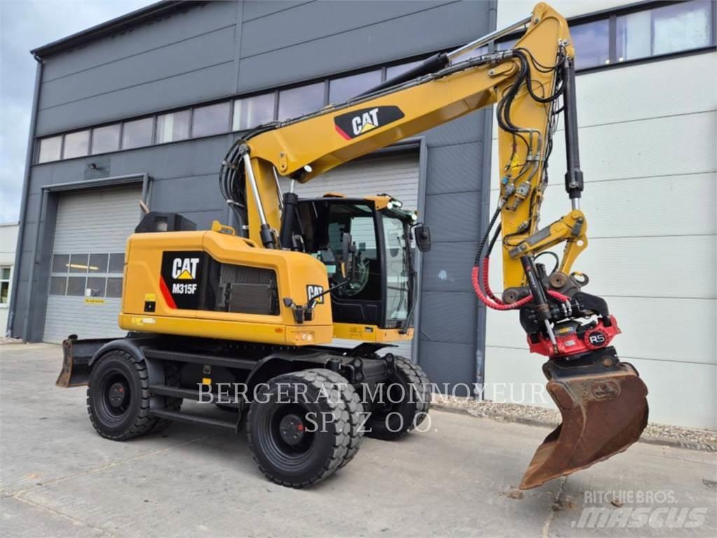 CAT M315F حفارات بعجل