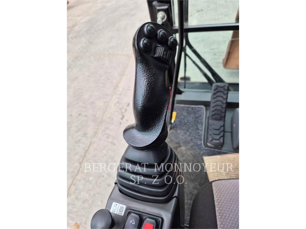 CAT M315F حفارات بعجل