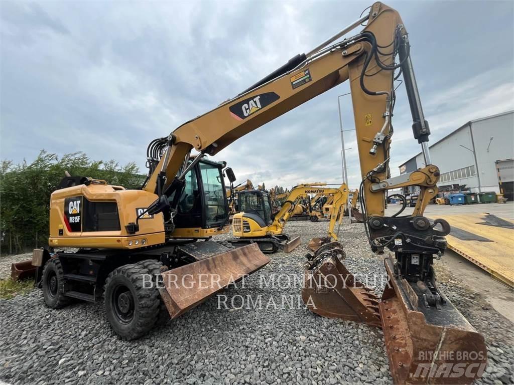 CAT M315F حفارات بعجل