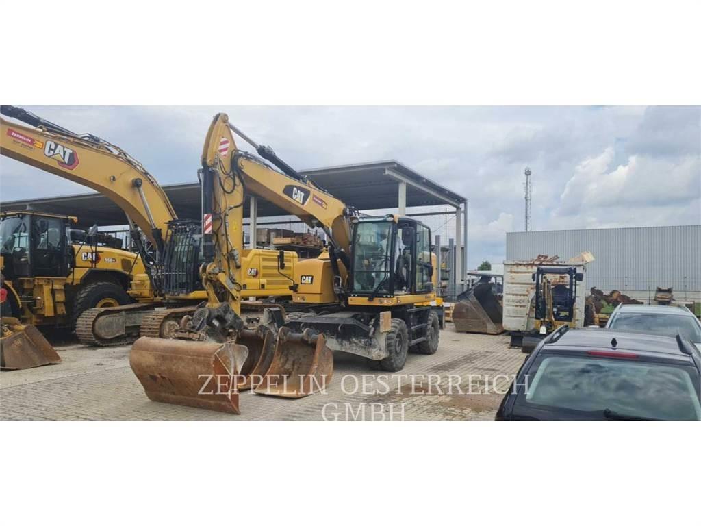 CAT M315F حفارات بعجل