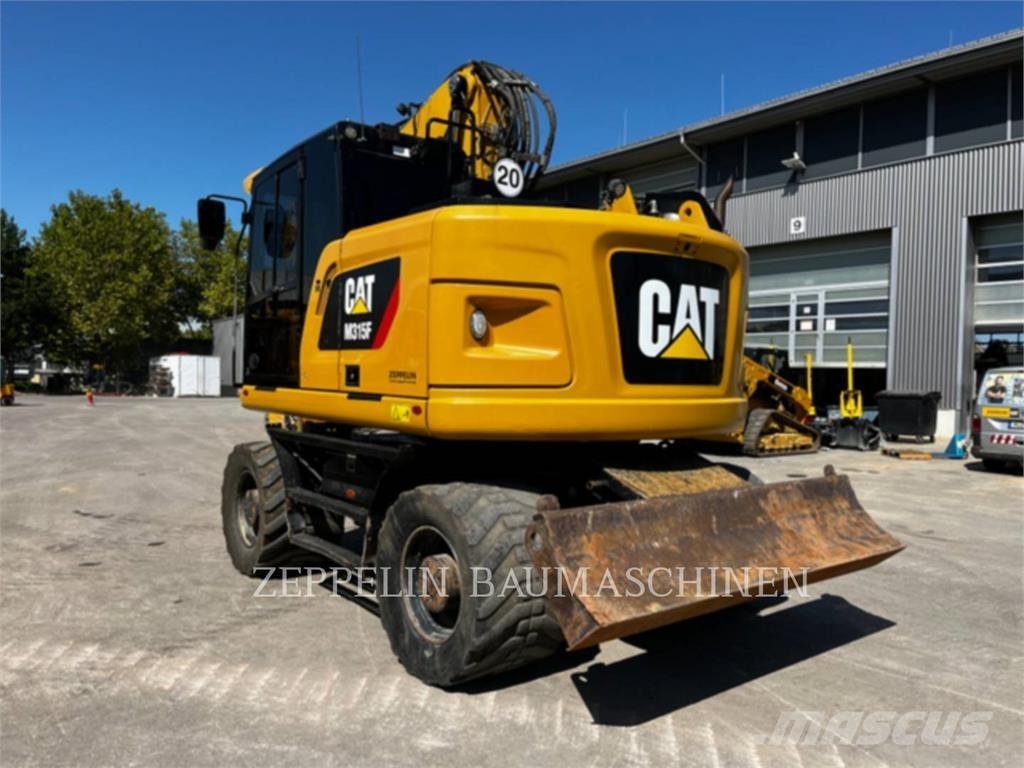 CAT M315F حفارات بعجل