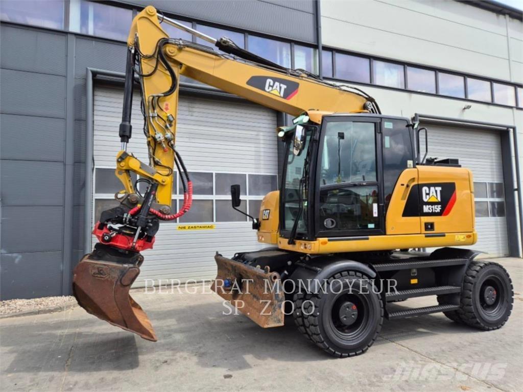 CAT M315F حفارات بعجل