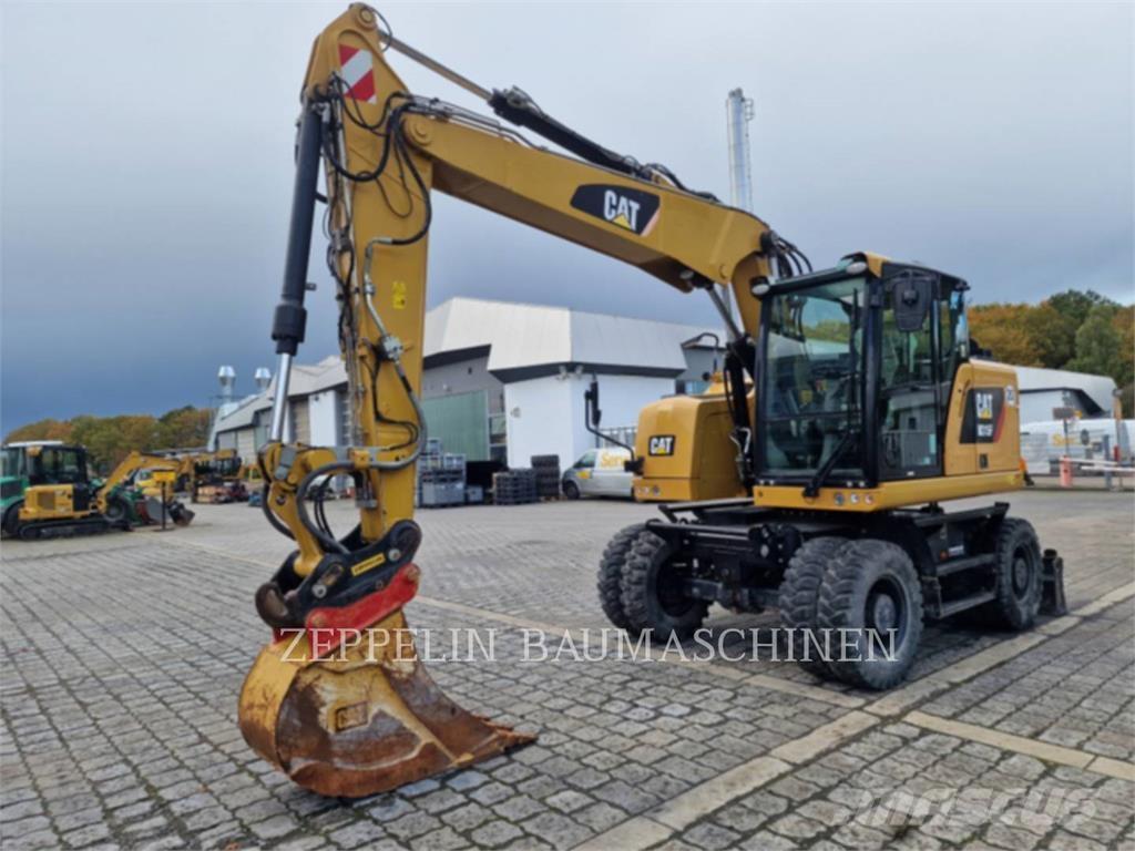 CAT M315F حفارات بعجل