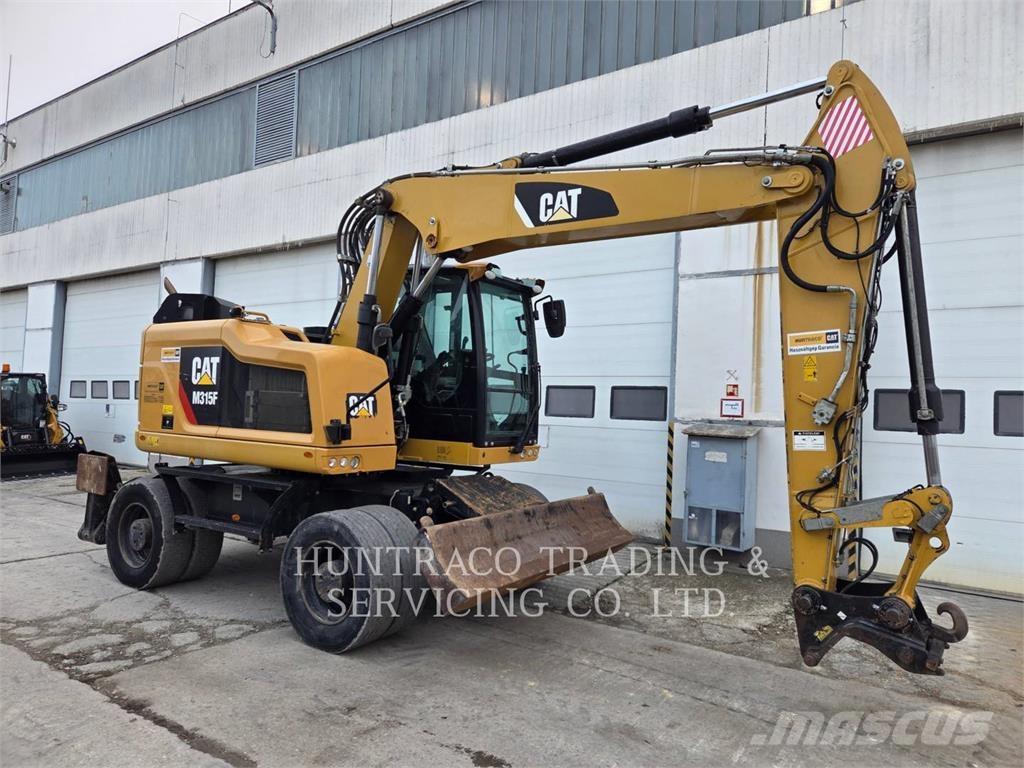 CAT M315F حفارات بعجل