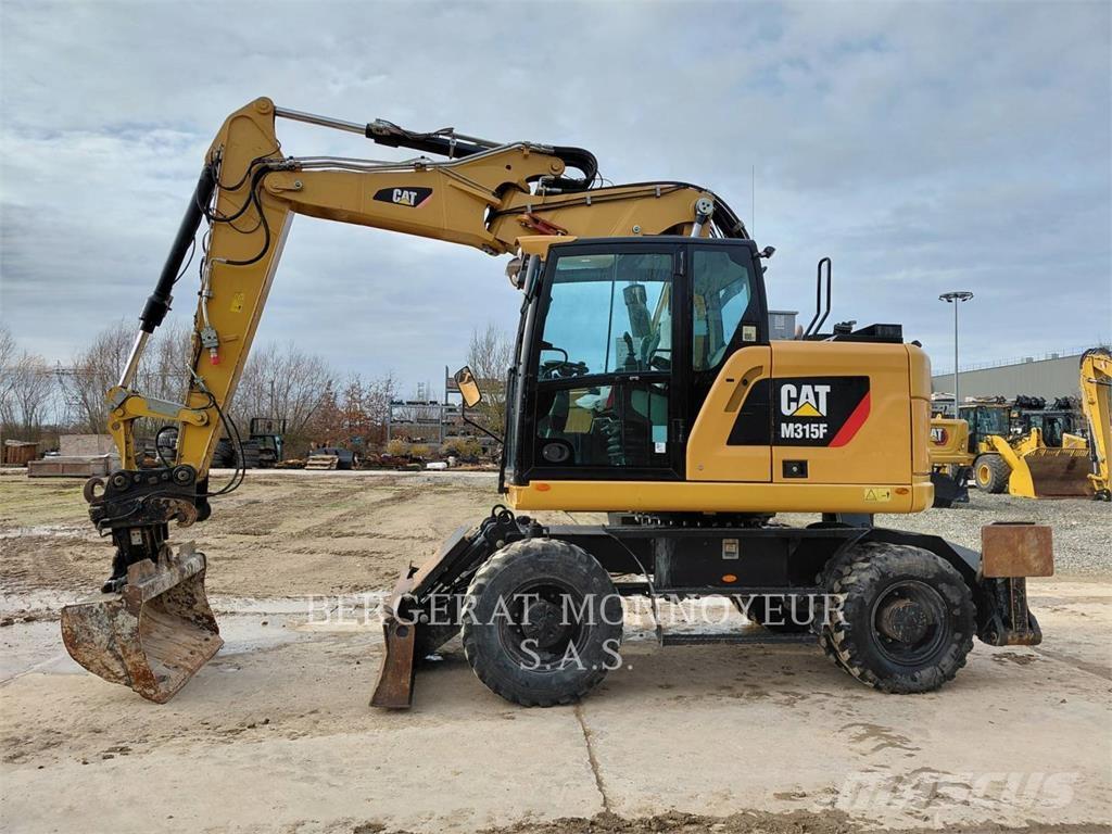 CAT M315F IVC حفارات بعجل