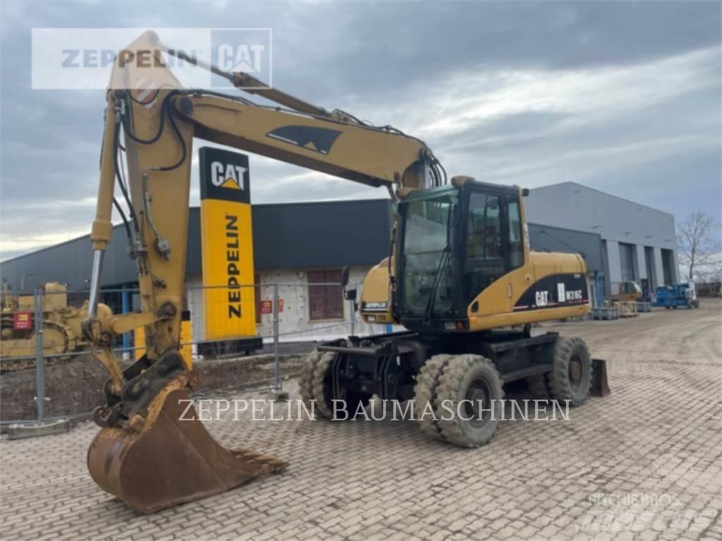 CAT M316C حفارات بعجل