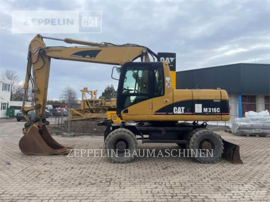 CAT M316C حفارات بعجل