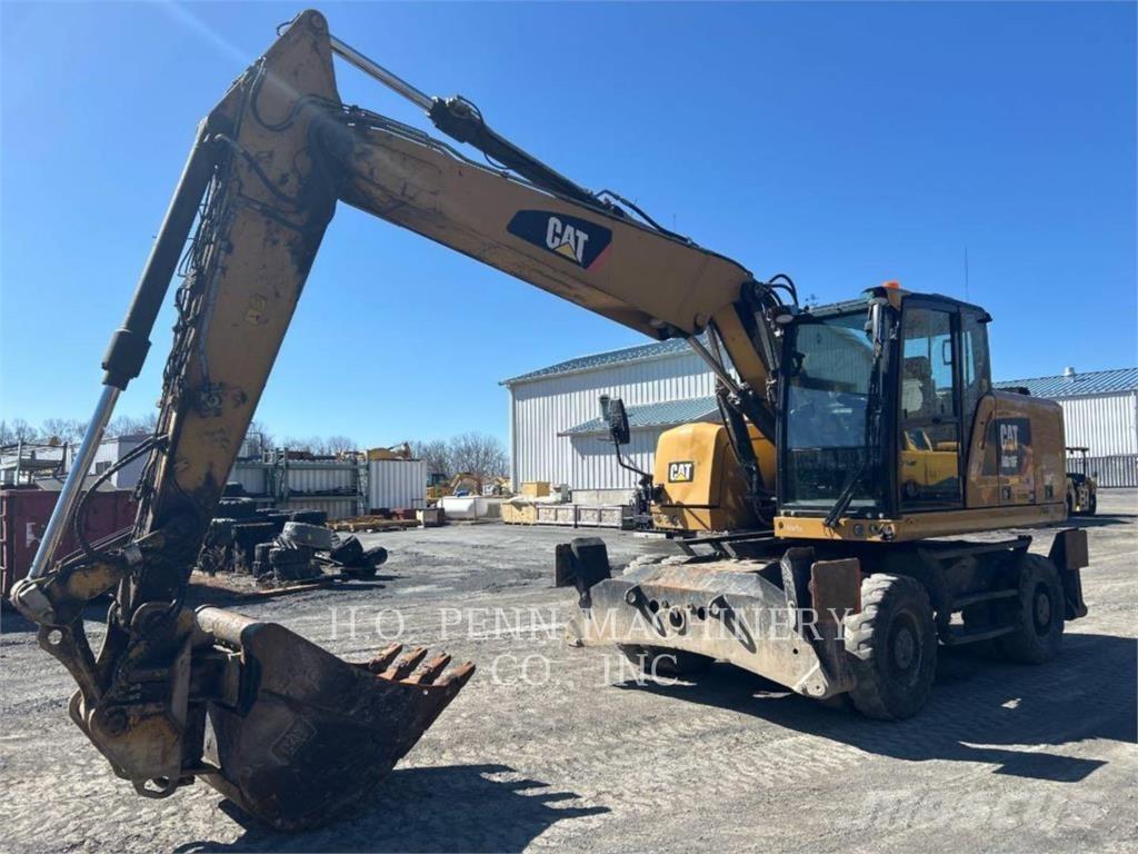 CAT M316F حفارات بعجل
