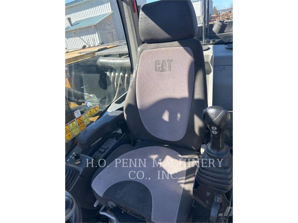 CAT M316F حفارات بعجل