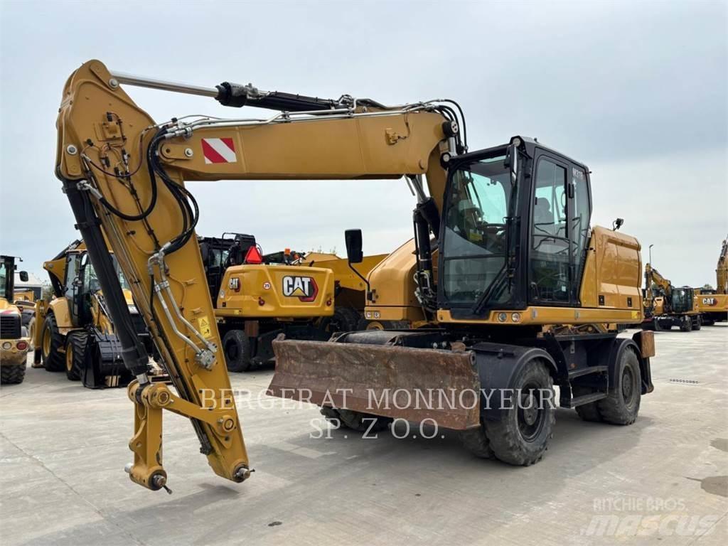 CAT M318 حفارات بعجل