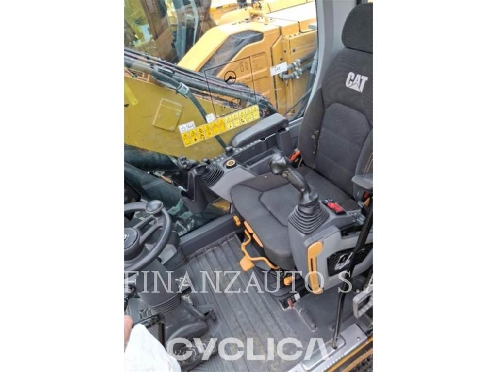 CAT M318 حفارات بعجل
