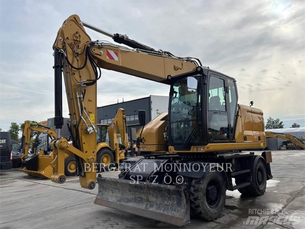 CAT M318 حفارات بعجل