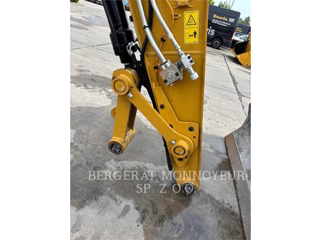 CAT M318 حفارات بعجل